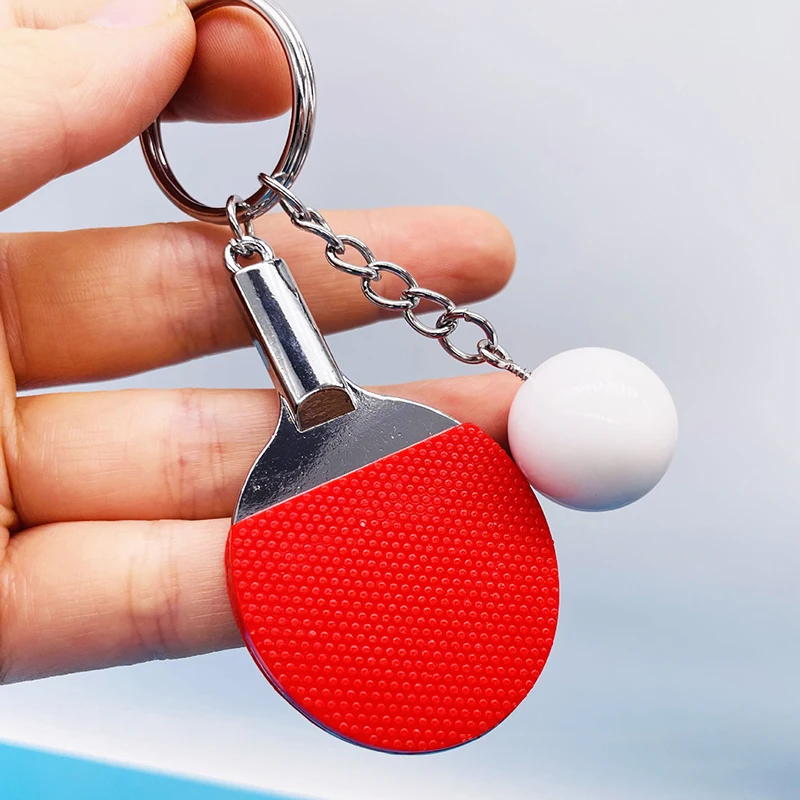 Table Tennis Keychain - 7 Farben Niedliche Tischtennisschläger-Anhänger Souvenir Tischtennisball